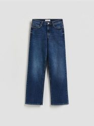 Jeansy straight ze średnim stanem - granatowy. Niebieskie jeansy damskie Reserved. Za 139.99 zł.