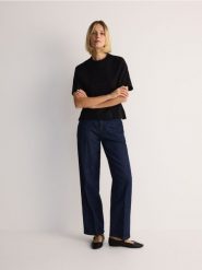 Jeansy z błyszczącym wykończeniem - granatowy. Niebieskie jeansy damskie Reserved. W wyprzedaży za 119.99 zł.