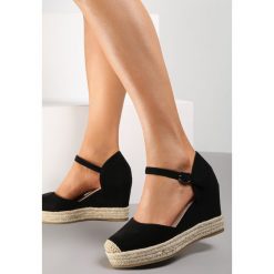 Czarne Sandały Ampatea. Czarne sandały damskie Renee, bez wzorów, bez obcasa, na koturnie, bez zapięcia. Za 64.99 zł.