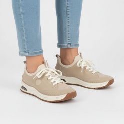 Półbuty damskie Rieker, cholewka ze skóry ekologicznej sportowa sylwetka wsuwane miękka amortyzowana podeszwa, beżowe, 44562-62. Brązowe półbuty damskie Rieker, bez wzorów, ze skóry ekologicznej, bez obcasa, na płaskiej podeszwie, bez zapięcia. Za 369.00 zł.