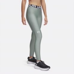 Legginsy treningowe damskie Under Armour HeatGear. Zielone legginsy damskie Under Armour, xs, bez wzorów. Za 109.99 zł.