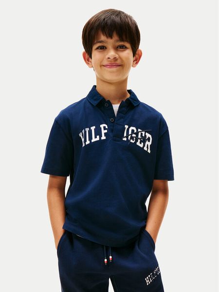 Tommy Hilfiger Spodnie dresowe Mixed Graphic KB0KB09695 Granatowy Regular Fit. Niebieskie spodnie dresowe chłopięce Tommy Hilfiger, z bawełny. Za 219.99 zł.