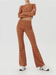 Legginsy flare ze wzorem geometrycznym - wielobarwny. Legginsy damskie Sinsay, l, bez wzorów. Za 59.99 zł.