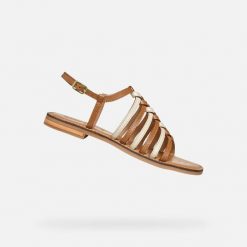 Sandały GEOX D MADDALUSIAC Brązowy. Brązowe sandały damskie Geox, bez wzorów, ze skóry, bez obcasa, bez zapięcia. Za 330.99 zł.