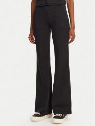 Juicy Couture Spodnie dresowe Active JCSML125403 Czarny Flared Leg. Czarne spodnie dresowe damskie Juicy Couture, xs, bez wzorów, z dresówki. Za 219.99 zł.