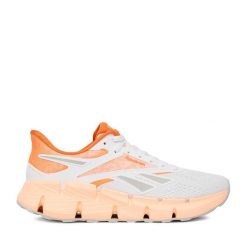 Buty do biegania Reebok. Białe obuwie sportowe damskie Reebok, bez zapięcia, do biegania. Za 369.99 zł.