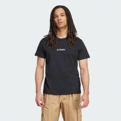 Koszulka Terrex Signature AOP Graphic. Czarne bluzki damskie Adidas, l, bez wzorów, z bawełny, bez kołnierzyka, bez ramiączek. Za 149.00 zł.
