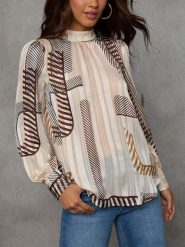 Milan Kiss Bluzka w kolorze beżowym rozmiar: S. Brązowe bluzki damskie Milan Kiss, s, bez wzorów, bez kołnierzyka, bez ramiączek. Za 126.99 zł.