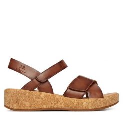 Sandały Josef Seibel. Brązowe sandały damskie Josef Seibel, bez wzorów, bez obcasa, na koturnie, bez zapięcia. Za 439.99 zł.