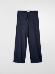 Spodnie dresowe wide leg - granatowy. Niebieskie spodnie sportowe damskie Sinsay, l, bez wzorów, z dresówki, na fitness i siłownię. Za 39.99 zł.