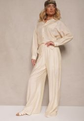 Jasnobeżowe Spodnie Palazzo High Waist z Szeroką Nogawką i Gumką w Talii Jenarielis. Brązowe spodnie materiałowe damskie Renee, bez wzorów, z jeansu. Za 69.99 zł.