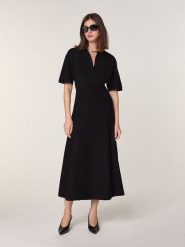 Rodier Wełniana sukienka w kolorze czarnym rozmiar: L. Czarne sukienki damskie Rodier, bez wzorów, z wełny, bez ramiączek. Za 499.19 zł.