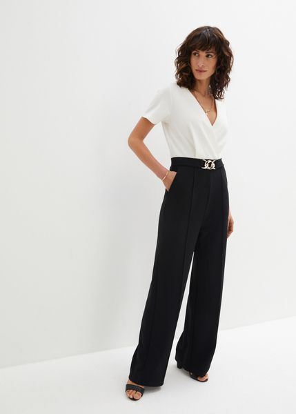 Kombinezon z dekoracyjną sprzączką. Czarne kombinezony damskie bonprix, bez wzorów, eleganckie, bez kołnierzyka, bez ramiączek. Za 219.99 zł.