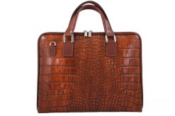 Torba na laptopa skórzana BARBERINI'S 118/1-6 brązowa. Brązowe torby na laptopa Barberinis, bez wzorów, ze skóry, z tłoczeniem. Za 359.99 zł.