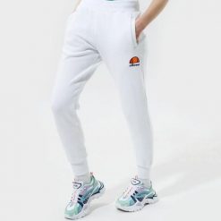 SPODNIE DAMSKIE DRESOWE ELLESSE SPORTOWE XS. Białe spodnie sportowe damskie Ellesse, uniwersalny, bez wzorów, z bawełny, na fitness i siłownię. Za 148.09 zł.