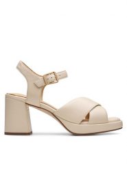 Clarks Sandały Ritzy75 Rae 26181304 Écru. Sandały damskie Clarks, bez wzorów, ze skóry, bez obcasa, na słupku, bez zapięcia. Za 409.99 zł.
