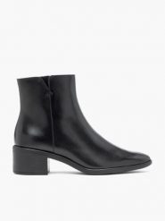 Czarne skórzane botki. Czarne botki damskie Ryłko, z materiału, eleganckie, bez obcasa, na obcasie, bez zapięcia. Za 449.99 zł.