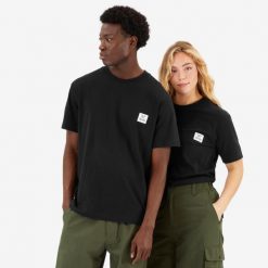 Koszulka uniseks z bawełny z certyfikatem Fairtrade/Max Havelaar. Czarne bluzki damskie SIMOND, l, bez wzorów, z bawełny, sportowe, bez kołnierzyka, bez ramiączek. Za 99.99 zł.