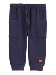 Coccodrillo Spodnie dresowe WC5120101SBN Granatowy Regular Fit. Niebieskie spodnie dresowe chłopięce COCCODRILLO, z bawełny. Za 49.90 zł.