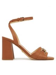 Guess Sandały FLJGRT LEA03 Brązowy. Brązowe sandały damskie Guess, z aplikacjami, ze skóry, bez obcasa, na słupku, bez zapięcia. Za 449.99 zł.