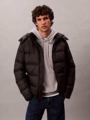 Calvin Klein Jeans kurtka puchowa Kobiety Sztuczne włókno czarny, L. Czarne kurtki damskie Calvin Klein Jeans, l, bez wzorów, z jeansu, bez kaptura. Za 849.95 zł.