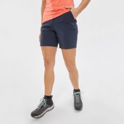 Spodenki turystyczne damskie Quechua MH100. Niebieskie spodenki sportowe damskie QUECHUA, m, bez wzorów, z materiału, trekkingowe. Za 59.99 zł.