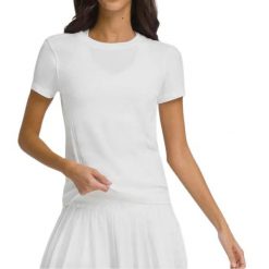 T-shirt Wilson Women's Seamless Pro. Białe t-shirty damskie Wilson, s, bez wzorów, bez kołnierzyka. W wyprzedaży za 235.10 zł.