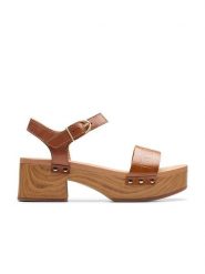 Clarks Skórzane sandały "Sivanne Bay" w kolorze jasnobrązowym na obcasie rozmiar: 37. Brązowe sandały damskie Clarks, bez wzorów, z otwartym noskiem, bez obcasa, na koturnie, bez zapięcia. Za 186.19 zł.