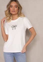 Biała Bluzka z Bawełny z Motywem Kokardki Norimar. Białe bluzki damskie Renee, l, bez wzorów, z bawełny, eleganckie, bez kołnierzyka, bez ramiączek. Za 44.99 zł.
