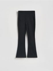 Legginsy flare - czarny. Czarne legginsy damskie Reserved, l, bez wzorów, z bawełny. Za 89.99 zł.