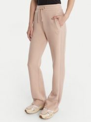 Guess Spodnie dresowe V3RB21 K7UW2 Beżowy Regular Fit. Brązowe spodnie dresowe damskie Guess, xxs, z aplikacjami, z dresówki. Za 399.99 zł.