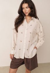 Beżowa Koszula na Lato z Bawełny o Kroju Oversize w Paski i Haftowany Wzór Deinaris. Brązowe koszule damskie Born2be, na lato, bez wzorów, z bawełny, eleganckie, bez kołnierzyka, bez ramiączek. Za 119.99 zł.