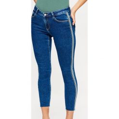 Jeansy SLIM z lampasem - Granatowy. Niebieskie jeansy damskie Cropp. Za 119.99 zł.