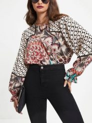 Milan Kiss Bluzka w kolorze kremowo-czarnym rozmiar: L. Brązowe bluzki damskie Milan Kiss, l, bez wzorów, bez kołnierzyka, bez ramiączek. Za 139.54 zł.