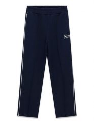 Guess Spodnie dresowe J6YB12 K3932 Granatowy Regular Fit. Niebieskie spodnie dresowe dziewczęce Guess, z aplikacjami, z dresówki. Za 214.99 zł.