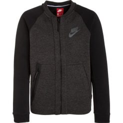 Nike Performance TECH FLEECE Bluza rozpinana black heather/black/anthracite. Czarne bluzy chłopięce Nike Performance, z bawełny. W wyprzedaży za 239.85 zł.