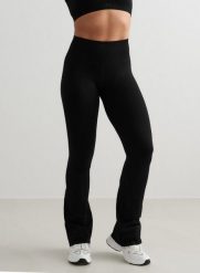 Damskie legginsy rozszerzane, wysoki stan squat proof Shape Seamless czarne. Czarne legginsy damskie Aim'n, xl, bez wzorów, z dzianiny, z podwyższonym stanem, na fitness i siłownię. Za 339.00 zł.