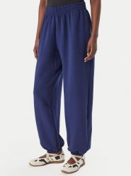 Adidas Spodnie dresowe Soft Lux KS7879 Niebieski Loose Fit. Niebieskie spodnie dresowe damskie Adidas, l, bez wzorów, z dresówki. Za 329.99 zł.