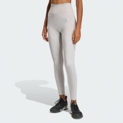 Legginsy Optime Essentials Workout Shine 7/8. Szare legginsy damskie Adidas, bez wzorów. Za 219.00 zł.