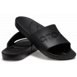 Klapki Crocs Slide 210088-001 czarne. Czarne klapki damskie bez wzorów, bez obcasa, bez zapięcia. Za 303.63 zł.