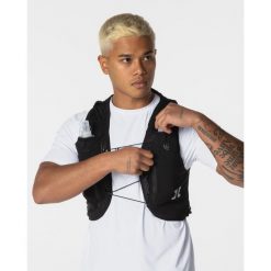 Kamizelka do biegania / Kamizelka nawadniająca – wiele przegród. Czarne kamizelki damskie HYSTRIDE, bez wzorów, bez kaptura. Za 195.00 zł.