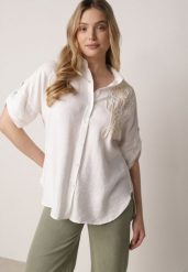 Biała Wiszkowa Koszula Nietoperzowa z Regulowanymi Rękawami i Haftem Maryrenna. Białe koszule damskie Born2be, na lato, l, bez wzorów, z materiału, casualowe, bez kołnierzyka, plus size, bez ramiączek. Za 69.99 zł.