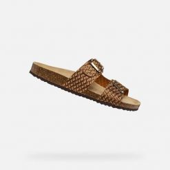 Sandały GEOX D BRIONIA Brąz. Brązowe sandały damskie Geox, bez wzorów, ze skóry, bez obcasa, bez zapięcia. Za 313.99 zł.