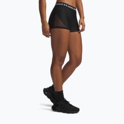 Spodenki treningowe damskie Under Armour HeatGear Mesh Shorty. Czarne obuwie sportowe damskie Under Armour, z meshu, bez zapięcia, na fitness i siłownię. Za 94.99 zł.