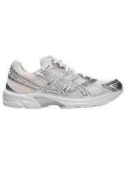 Damskie tenisówki Asics. Brązowe trampki damskie Asics, bez wzorów, z materiału, bez zapięcia. Za 474.55 zł.