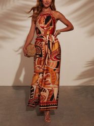 Milan Kiss Kombinezon ze wzorem rozmiar: S. Kombinezony damskie Milan Kiss, s, bez wzorów, bez kołnierzyka, bez ramiączek. Za 140.20 zł.