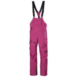 Damskie spodnie narciarskie na szelkach Helly Hansen Powderqueen. Czerwone spodnie sportowe damskie Helly Hansen, na zimę, bez wzorów, narciarskie. W wyprzedaży za 1,208.00 zł.