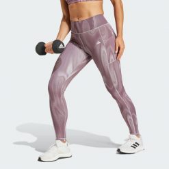 Legginsy Optime Full-Length Print. Czarne legginsy damskie Adidas, m, bez wzorów, z materiału. W wyprzedaży za 250.45 zł.