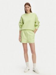 Lacoste Szorty sportowe GF9991 Zielony jasny Regular Fit. Zielone spodenki sportowe damskie Lacoste, bez wzorów, z bawełny. Za 359.99 zł.