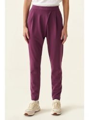 TATUUM Spodnie w kolorze fioletowym rozmiar: L. Różowe spodnie materiałowe damskie TATUUM, bez wzorów, z materiału. Za 117.45 zł.